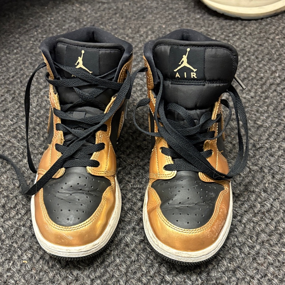 Jordan Black and Gold High-Top Sneakers 5.5 big kids
